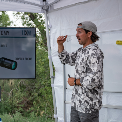 Ian teaching optics and ballistics during a Cornerstone class